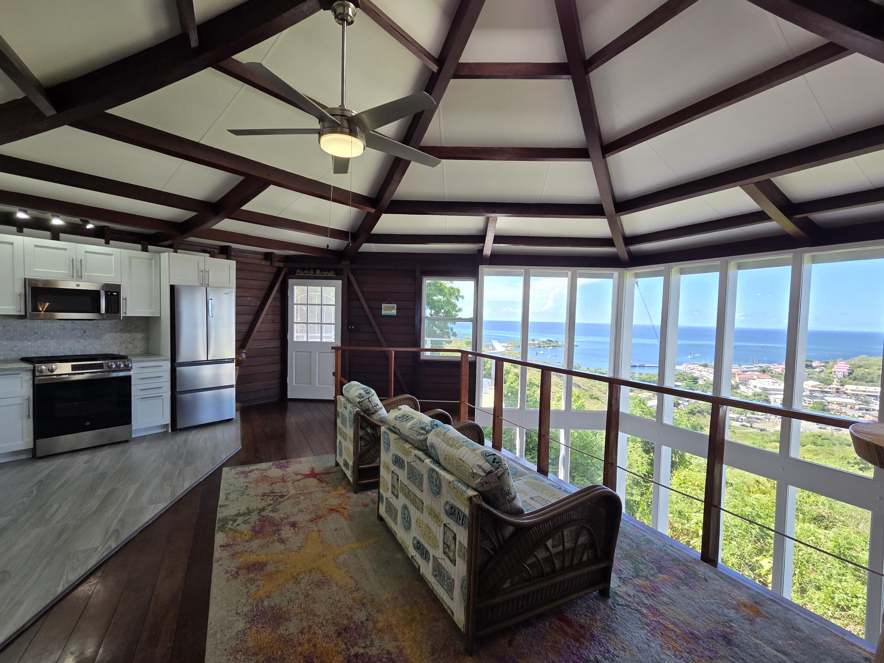 Floor-to-ceiling harbor views inside 76 Recovery Welcome